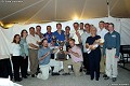 The team celebrates their Triple Crown Championship at the year end banquet. 